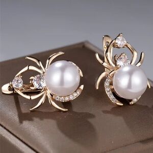 Elegant Gold and White Pearl Spider Earrings